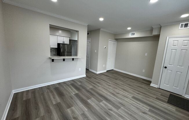 Bright and sunny corner 1br 1ba condo w patio in Clarendon. FULLY RENOVATED!