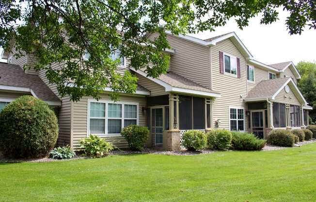 exterior of townhomes with beautiful landscaping