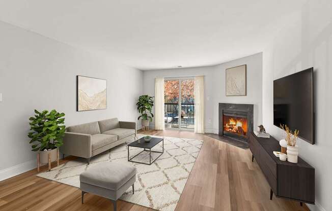 A living room with a fireplace and a couch.