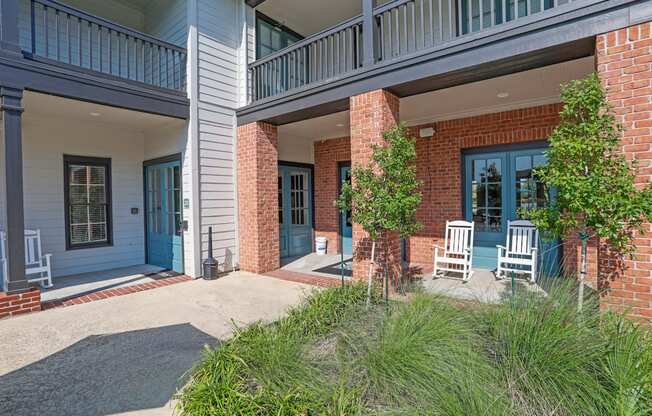 Entrance to leasing office with brick pillars at Ultris Island Park in Shreveport, LA