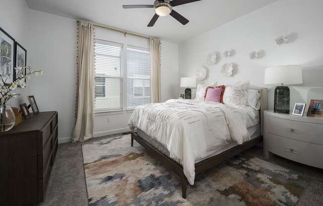 Master Bedroom with a Ceiling Fan at Parc View Apartments and Townhomes Midvale, UT 84047