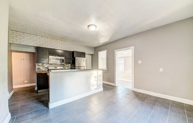 AVAILABLE NOW - 3 Bedroom Home w/ GARAGE! Ask how you can get up to one month of free rent!