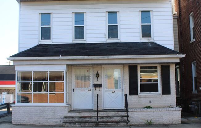 4 Bedroom Duplex with attached commercial space!