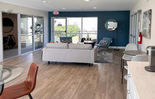 Clubhouse with comfortable seating and coffee bar  at Huntsville Landing Apartments, Alabama, 35806