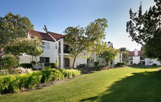 Stunning Apartment Facade Surrounded by Perfectly Trimmed Grass at Laurel Creek, Fairfield, California