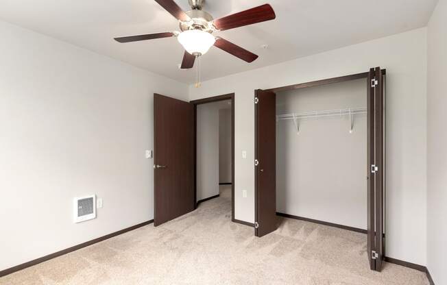 Pioneer Meadows Bedroom with Closet and Carpet
