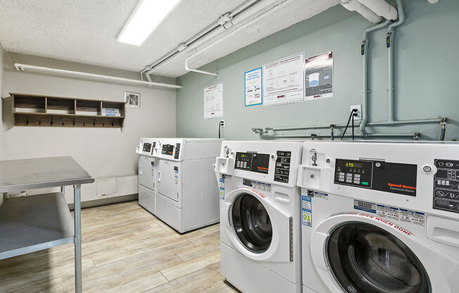 On-site laundry room with washers and dryers.