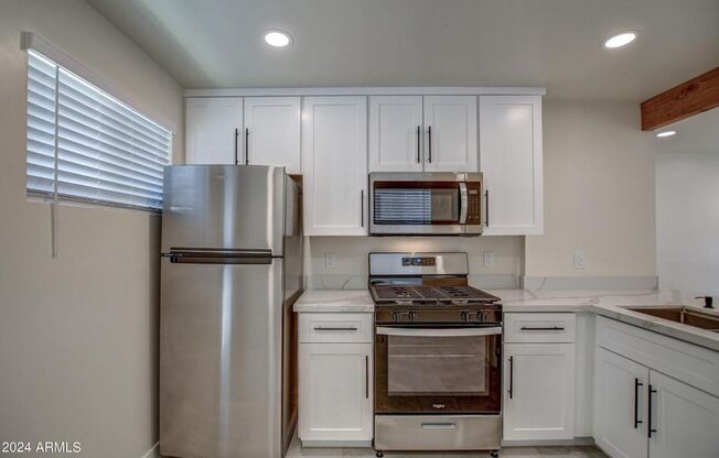 Stunning updated Townhome minutes to ASU campus available October 1st. 2 Bedroom, 1 bathroom completely updated with all appliances including washer and dryer in unit and your owner private yard.   Available October 1, 2026