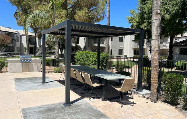 An ideal lounge setting for poolside enjoyment at Boulders at Lookout Mountain Apartment Homes, Arizona, 85022