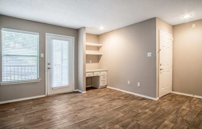 Living Room and Unit Entryway at The Players Club Apartments in Nashville, TN