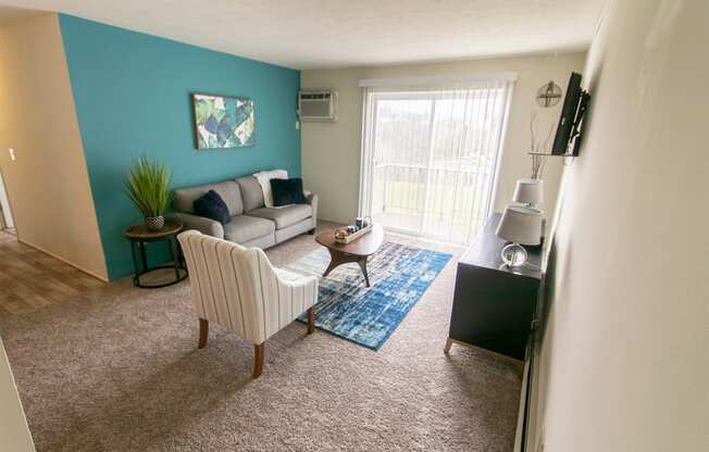 This is a photo of the living room in the 705 square foot 2 bedroom, 1 bath apartment at Lisa Ridge Apartments in the Westwood neighborhood of Cincinnati, Ohio.