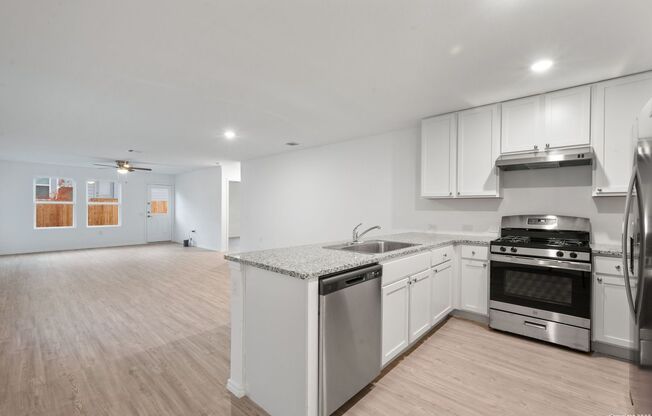 This beautiful single-story home has 4 bedrooms, 2 baths, vinyl flooring throughout, an open floor plan