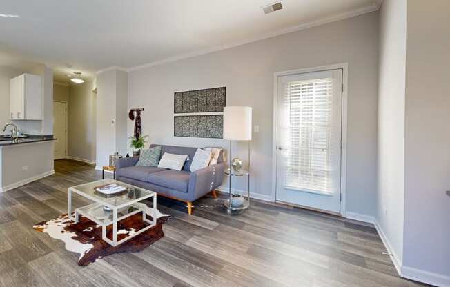 a living room with a couch and a coffee table