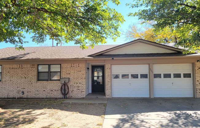 Leasing now! Cozy and comfortable 3/2/2 Brick Home