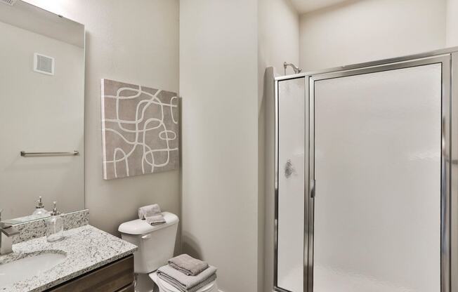 a bathroom with a shower and a sink and a toilet  at Aventura at Hawk Ridge, Lake St Louis