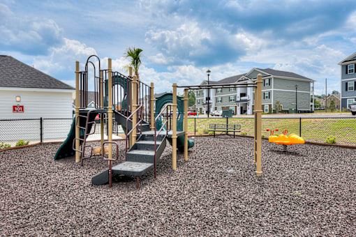 Playground with swings and slide at MacArthur Park, Augusta Georgia
