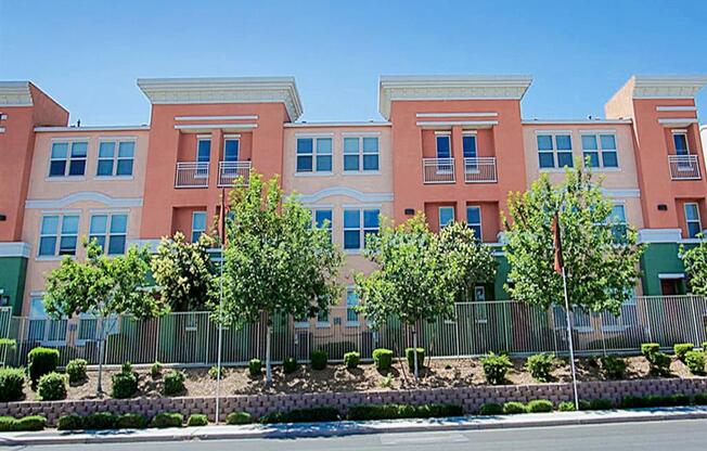 Street view of The Croix Townhomes in Henderson, NV offers 2 and 3 bedroom Townhomes!