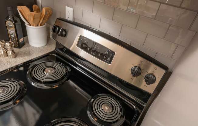 an oven in a kitchen with a stove top