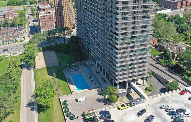 Image of the pool at the Jefferson. There is a green grass courtyard next to the pool.