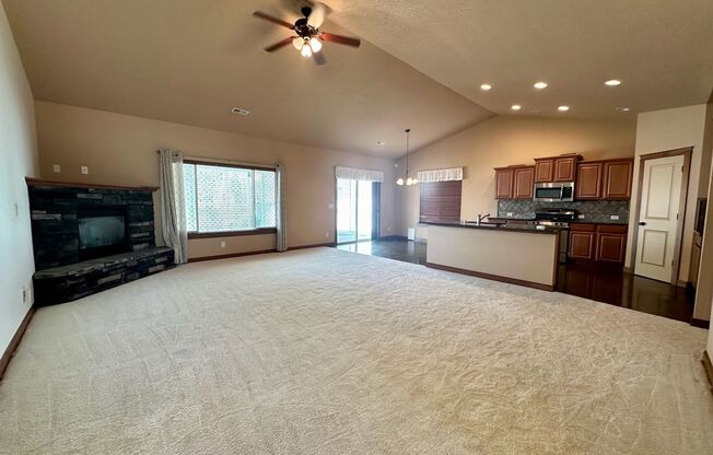 $500 OFF MOVE-IN SPECIAL! Beautiful 3 Bed 2 Bath Five Mile Rancher w/ Huge Attached 3rd Garage + Mezzanine and Fully-Fenced Yard!