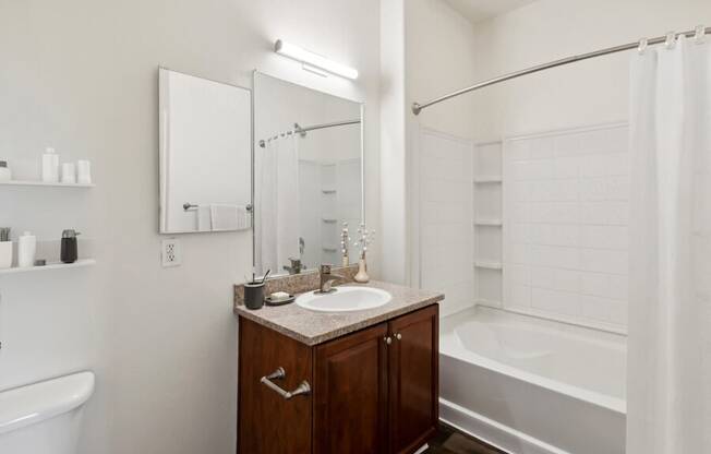 a bathroom with a sink and a bath tub