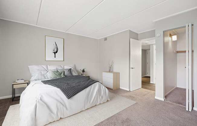 Model Bedroom with Carpet, Closet & Hallway View  at Elevate on Parkway, Burnsville