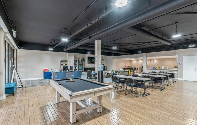 Clubhouse game room with pool table