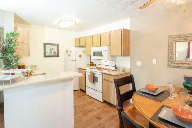 Dining Room and Kitchen View at Bent Tree Apartments, Sacramento, California