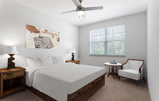A bedroom with a San Francisco map on the wall.