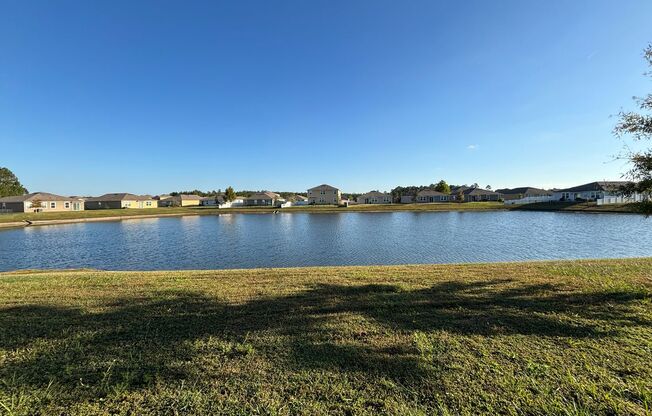 Beautiful 4 Bed 3 Bath Home. Move-In Ready with Amenities. Double Garage. Peaceful Water View! Washer Dryer Included!