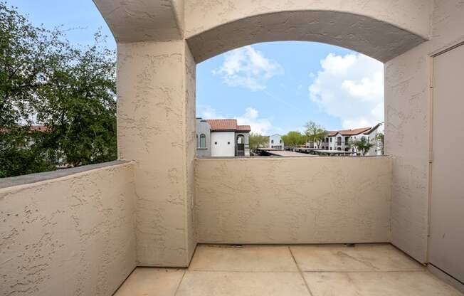 a balcony with a view of the skyline