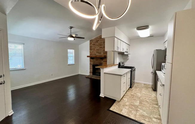 Charming 3-Bed Townhouse with Fireplace, Private Yard & Modern Upgrades — 2905 Burning Oak Dr #A