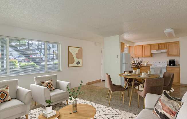 a living room with couches and chairs and a dining room table