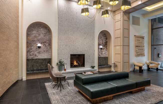 a living room with a fireplace and a couch