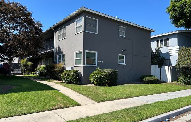Fresh 2 bedroom 1 bath upper unit ready to rent! Small garage included!.