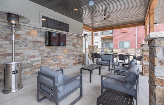 a living room filled with furniture and a fireplace