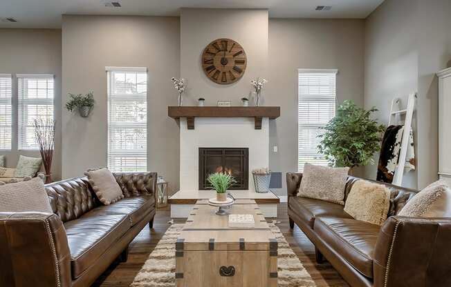 a living room with couches and a coffee table