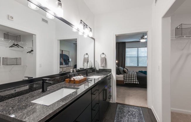 our apartments offer a bathroom with a shower and double sinks