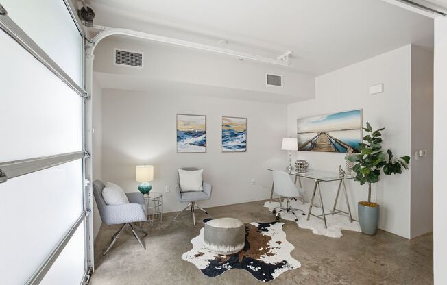 1-Bedroom + Den/Office, 2-Bath Townhome with EV Charging & Secure Parking