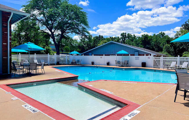 A swimming pool with a red and white striped edge.