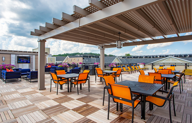 Pergola seating on an expansive rooftop deck