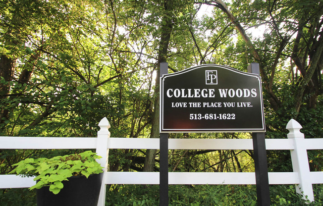This is a photo of the entrance sign at College Woods Apartments in Cincinnati, OH.