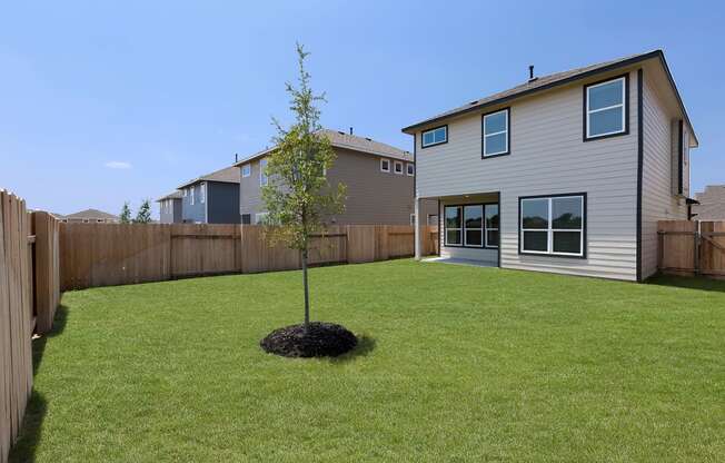 Rivers Edge Apartments Private, Fenced Backyards with Grass
