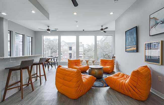 clubhouse with orange chairs