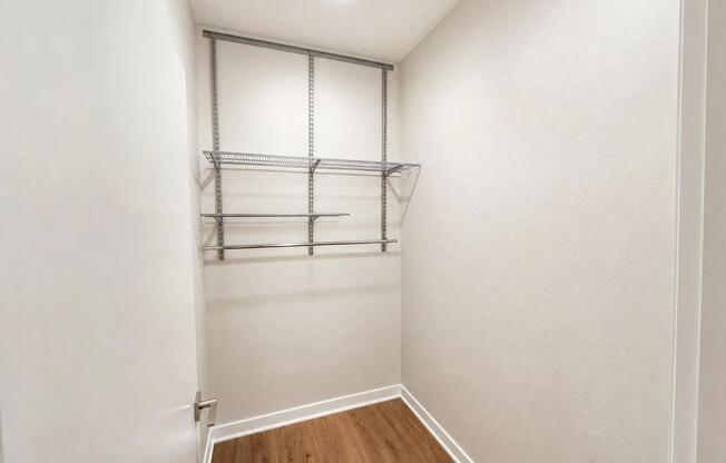 Spacious closet with built-in shelving.