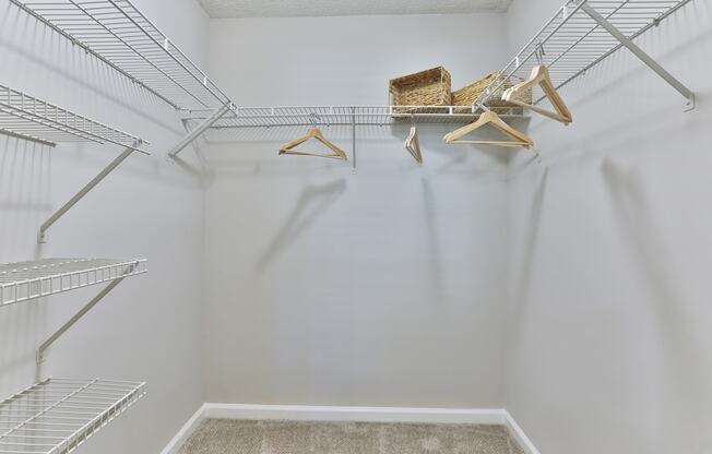 a walk in closet in a 555 waverly unit