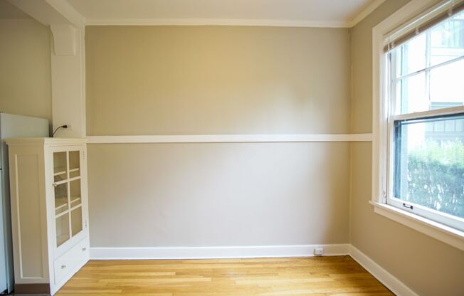 Ladd's Addition: Sunny Studio with Hardwoods + Lovely Architectural Appeal!
