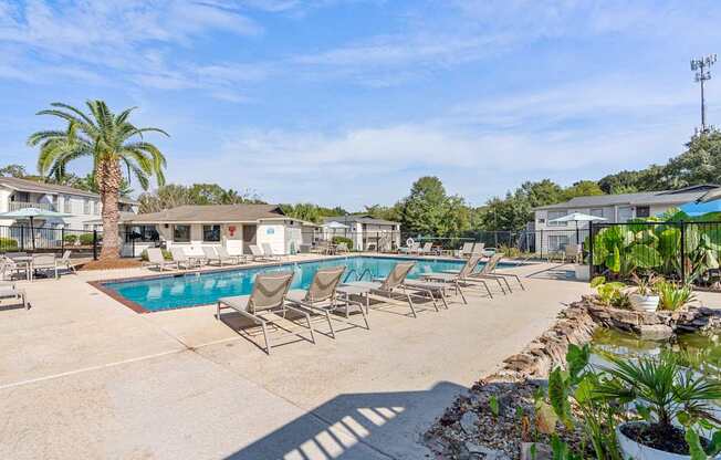 sparkling pool and sundeck at 701 South Apartments in Mobile, AL