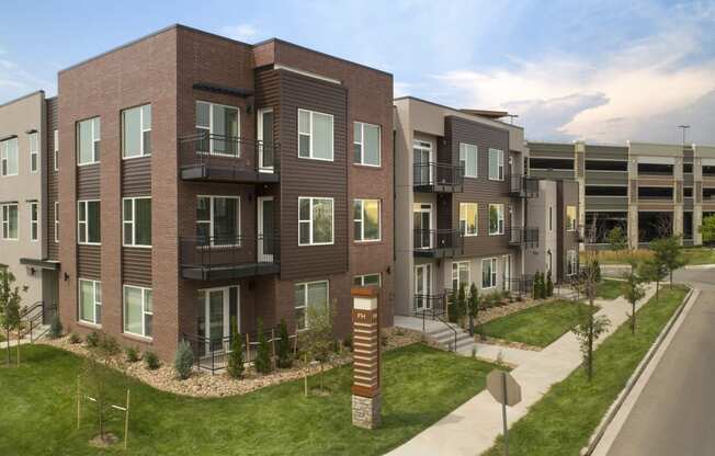 a rendering of an apartment building on a city street