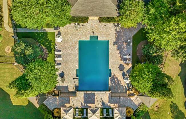 arial view of a house with a pool